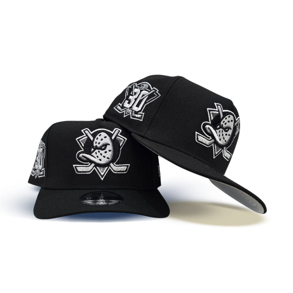 Black Anaheim Mighty Ducks Silver Bottom 30th Anniversary Side Patch New Era Curved Brim A-Frame 9Forty Snapback