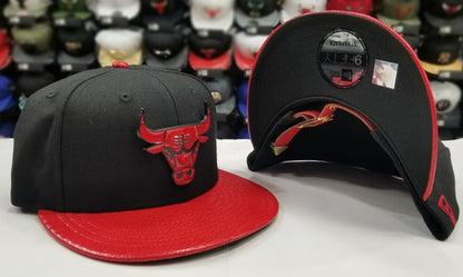 New Era 9Fifty NBA Chicago Bulls Black / Red Metal Badge Strapback Hat