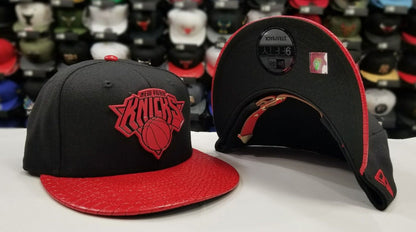 New Era 9Fifty NBA New York Knicks Black / Red Metal Badge Strapback Hat